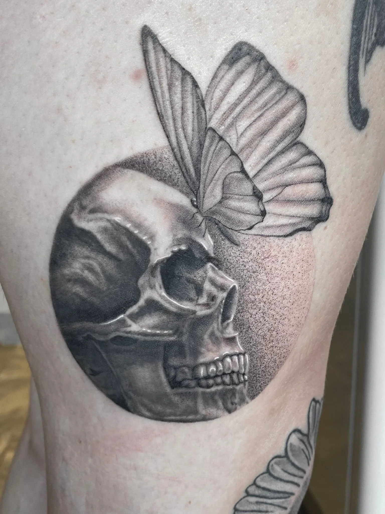 Featured tattoo by Emily Vinson